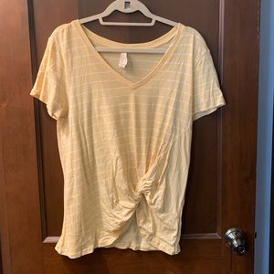 Yellow striped tee with knot on bottom